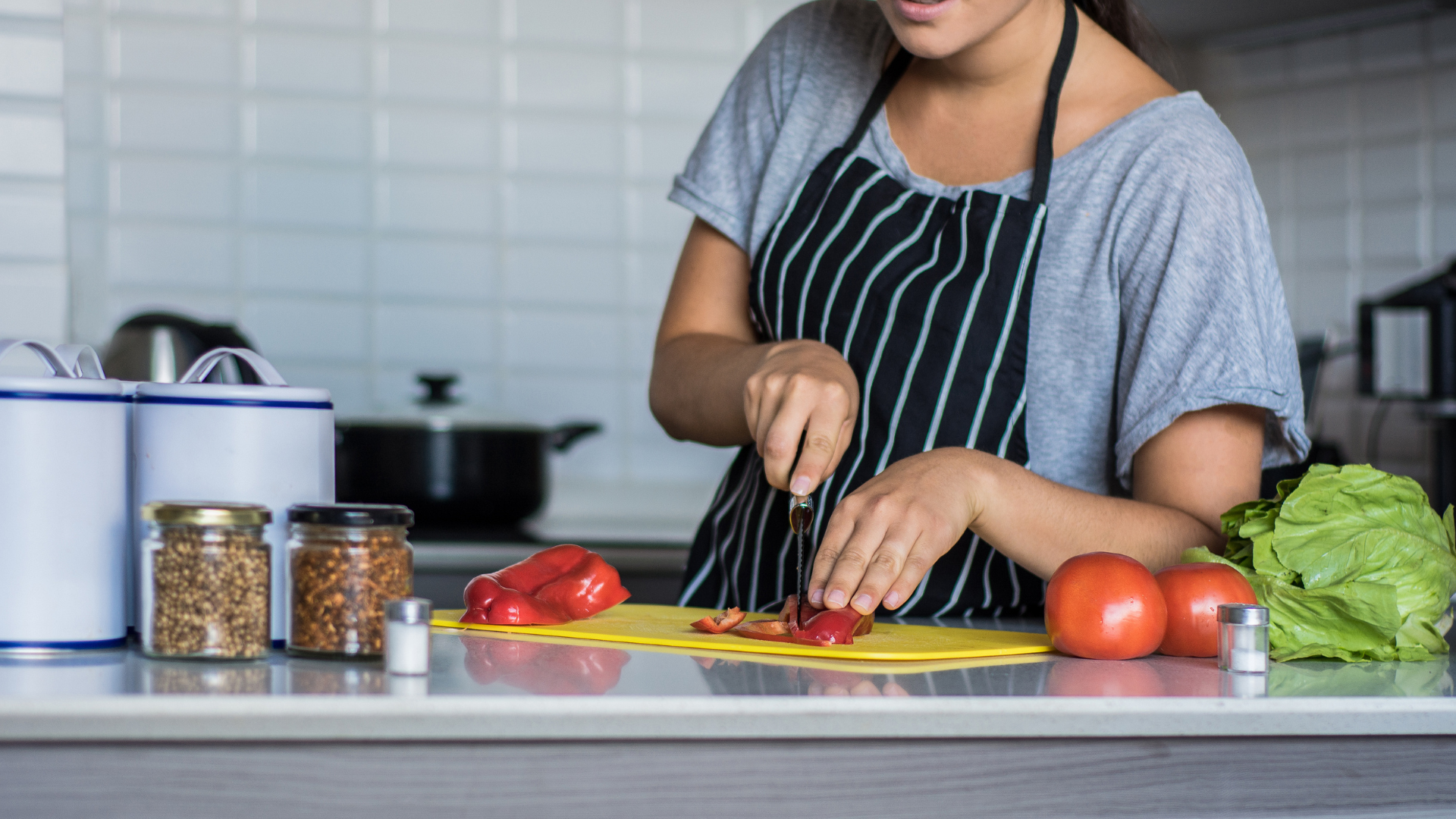6 young Woman cutting vegetable